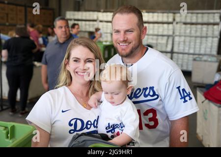 Los Angeles Dodgers infielder Max Muncy, wife Kellie Muncy and daughter Sophie Muncy pose at Dodgers Foundation and MLB All-Star Legacy initiative project, Friday, July 8, 2022, in Los Angeles. Stock Photo