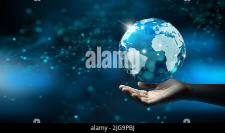 Businessman man holding crystal digital world. Global network connection, Big data analytic, Business intelligence and Technology connection concept. Stock Photo