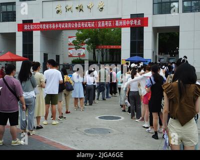 YICHANG, CHINA - JULY 9, 2022 - Candidates queue up to take the 2022 Civil service exam in Yichang, Central China's Hubei province, July 9, 2022. Stock Photo