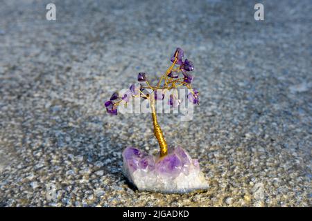 Feng shui gem tree, also called feng shui crystal tree, are a popular cure in the traditional feng shui school applications. Tree of life happiness co Stock Photo