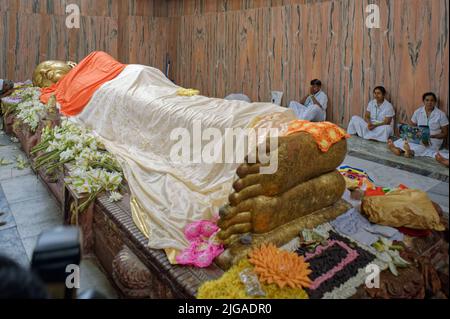 08 28 2008 Golden Buddha's foot at the temple Mahaparinirvana Kusinara or Kushinagar, Uttar Pradesh, India Stock Photo