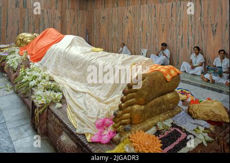 08 28 2008 Golden Buddha's foot at the temple Mahaparinirvana Kusinara or Kushinagar, Uttar Pradesh, India Stock Photo