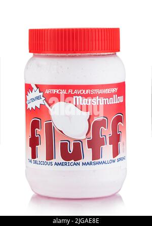 LONDON,UK - MAY 29, 2022: Fluff strawberry delicious american marshmallow spread on white. Stock Photo