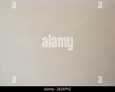 Color Wall after Paint with a Paint Roller and Brush. Home renovating with color Stock Photo