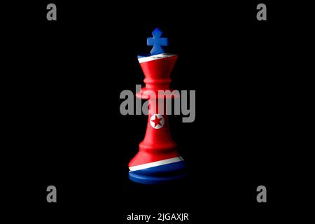 North Korea flags paint over on chess king. 3D illustration. Stock Photo