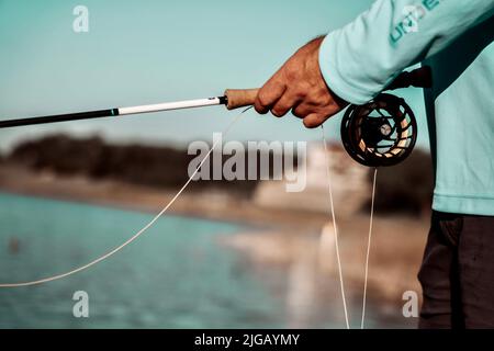 Hand of Man Hold a Fishing Rod for Catching Stock Photo - Image of happy,  person: 215074008