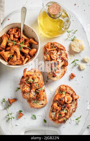 Vegetarian and crunchy toasts as a quick snack for lunch. Toasts made with cheese and whole grain bread. Stock Photo