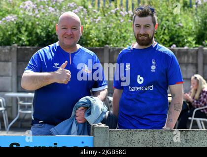 BAMBER BRIDGE, UK. JUL 9TH  Oldham fans before the Pre-season Friendly match between Bamber Bridge FC and Oldham Athletic at the Sir Tom Finney Stadium, Bamber Bridge on Saturday 9th July 2022. (Credit: Eddie Garvey | MI News) Stock Photo