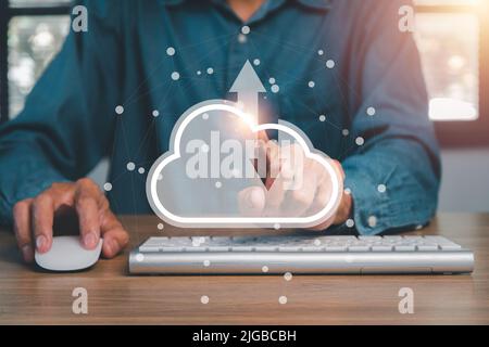 Man hand using computer with cloud computing icon, Cloud computing concept, Backup Storage Data Internet, networking and digital, Share global, techno Stock Photo