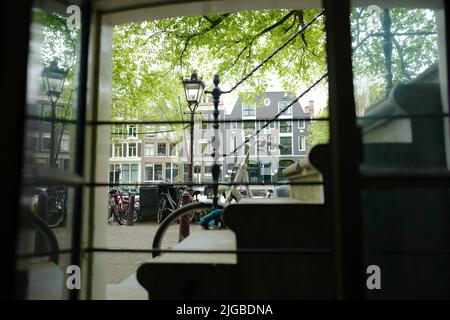 View from a subterranean apartment at Brouwersgracht in Amsterdam Stock Photo