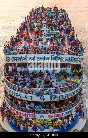 People are leaving the city by launch for celebrating Eid Ul Adha. This photo was taken on 2022-07-07 from Postagola bridge, Dhaka, Bangladesh, South Stock Photo