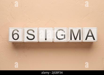 Cubes with text 6 SIGMA on color background Stock Photo