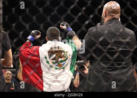 PHOENIX, AZ - JULY 8: Alfonso Leyva and Daniel Reis meet in the octagon for their Welterweight bout at LFA 135 at the Arizona Federal Theatre on July 8, 2022 in Phoenix, Arizona, United States.(Photo by Alejandro Salazar/PXImages) Stock Photo