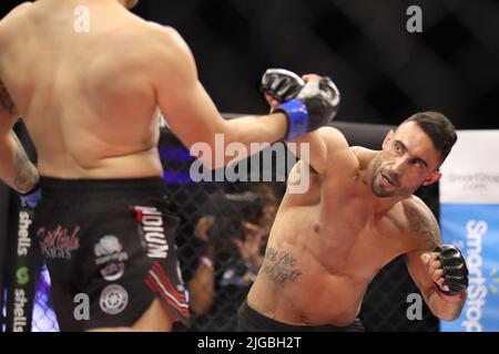 PHOENIX, AZ - JULY 8: Alfonso Leyva and Daniel Reis meet in the octagon for their Welterweight bout at LFA 135 at the Arizona Federal Theatre on July 8, 2022 in Phoenix, Arizona, United States.(Photo by Alejandro Salazar/PXImages) Stock Photo