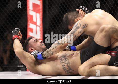 PHOENIX, AZ - JULY 8: Alfonso Leyva and Daniel Reis meet in the octagon for their Welterweight bout at LFA 135 at the Arizona Federal Theatre on July 8, 2022 in Phoenix, Arizona, United States.(Photo by Alejandro Salazar/PXImages) Stock Photo