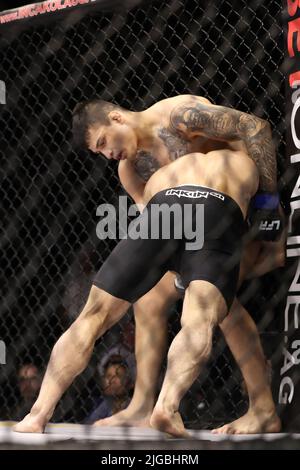 PHOENIX, AZ - JULY 8: Alfonso Leyva and Daniel Reis meet in the octagon for their Welterweight bout at LFA 135 at the Arizona Federal Theatre on July 8, 2022 in Phoenix, Arizona, United States.(Photo by Alejandro Salazar/PXImages) Stock Photo