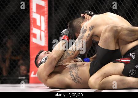 PHOENIX, AZ - JULY 8: Alfonso Leyva and Daniel Reis meet in the octagon for their Welterweight bout at LFA 135 at the Arizona Federal Theatre on July 8, 2022 in Phoenix, Arizona, United States.(Photo by Alejandro Salazar/PXImages) Stock Photo