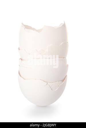 Stack of egg shells on white background Stock Photo