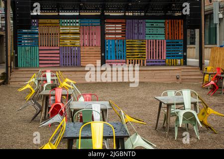 outside seating area in the rain at Industry City Sunset Park Brooklyn NYC Stock Photo