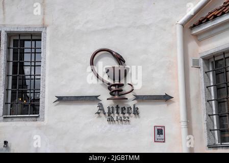 Symbol of oldest chemist shop on wall in historic town at capital city Stock Photo