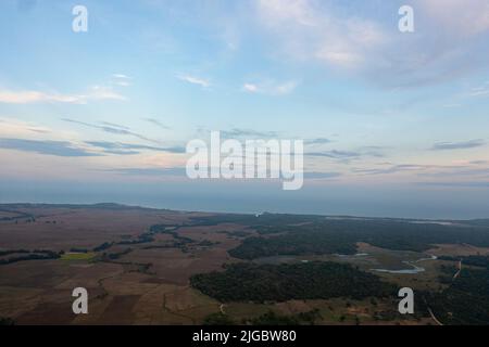 Aerial drone of Sunset over countryside in Sri Lanka. Stock Photo