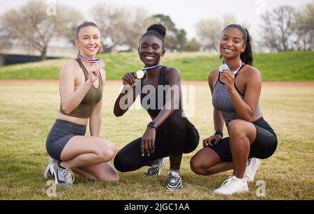 We made it to our destination. Full length portrait of three attractive young female athletes celebrating their victory. Stock Photo