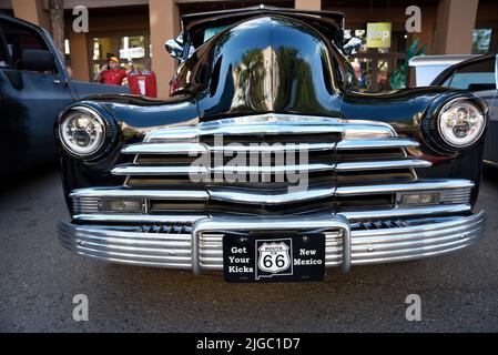 A Route 66 front license plate on a 1947 Chevrolet Fleetmaster on display at a car show in Santa Fe, New Mexico. Stock Photo