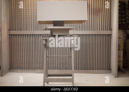 Items in garage. Workplace for creating structure. Production shop. Working tools on table. Stock Photo