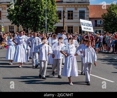 Straznice, Czech Republic - June 25, 2022 International Folklore Festival. Children's ensemble in white folk costumes Stock Photo