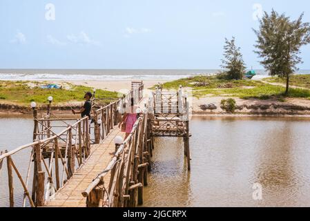 Mandrem Beach, Goa India March 2 2022: Tourists and families relaxing and enjoying at Mandrem Beach in Goa India Stock Photo