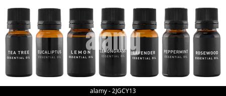 Set of essential oil bottles isolated on a white. Lavender, lemongrass, lemon, peppermint, rosewood, tea tree and eucalyptus oils. Natural cosmetic Stock Photo