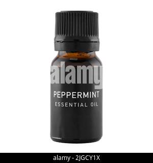 A bottle of peppermint essential oil isolated on a white background. The idea of natural cosmetic, natural oils, emotional wellbeing and skincare. Cli Stock Photo