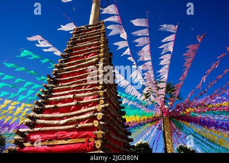 decorative bonfire and colorful flags of festa junina in brazil Stock Photo