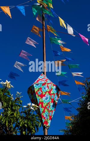 colorful flags and decorative balloons of festa junina in brazil Stock Photo