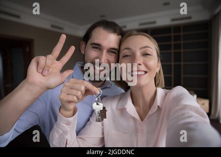 Excited happy proud couple of homeowners beginning living together Stock Photo