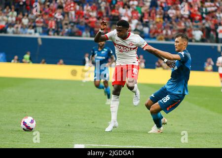 Saint Petersburg, Russia. 09th July, 2022. Nuraly Alip (No.28) of Zenit and Quincy Promes (No.10) of Spartak seen during the Olimpbet Russian Football Super Cup football match between Zenit Saint Petersburg and Spartak Moscow at Gazprom Arena. Final score; Zenit 4:0 Spartak. Credit: SOPA Images Limited/Alamy Live News Stock Photo
