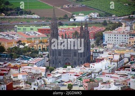 View from the Montana de Arucas over the village Arucas with cathedral San Juan Bautista, landmark of Arucas, Grand Canary, Canary islands, Spain Stock Photo