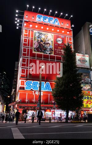 Akihabara, Japan- July 29, 2020: A building glows with it's lights turned on in Akihabara. Stock Photo