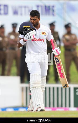 Galle, Sri Lanka. 10th July 2022. Sri Lanka's  Dinesh Chandimal celebrates his century by kissing his helmet during the 3rd day of the 2nd test cricket match between Sri Lanka vs Australia at the Galle International Cricket Stadium in Galle on 10th July, 2022. Viraj Kothalwala/Alamy Live News