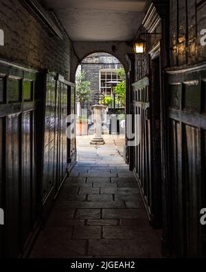 London, UK - August 12th 2021: Alleyway leading to Pickering Place in London, UK - known for being the smallest square in London. Stock Photo