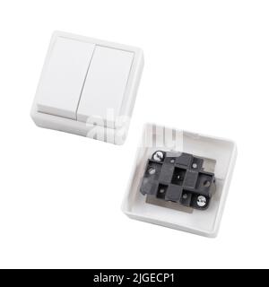 Built-in light switch with 2 keys isolated on a white background. Photograph of the switch front and back. Stock Photo