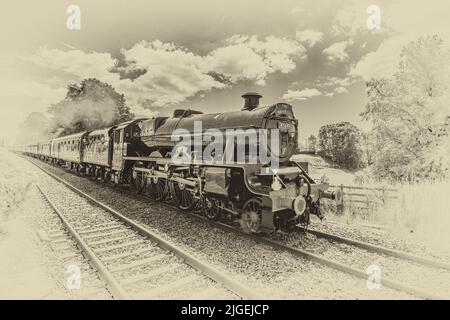 Leander,  BR 45690,  preserved British Steam locomotive, passing through Long Preston on 10th July 2022.........The Waverley, York to Carlisle tour. Stock Photo