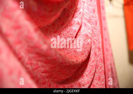 Isolated shots of freeze motion of red satin. Stock Photo
