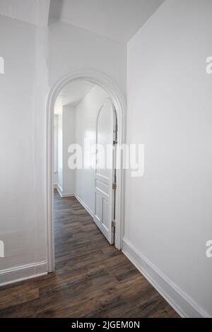 Arched doorway and door in residential home, Philadelphia USA Stock Photo