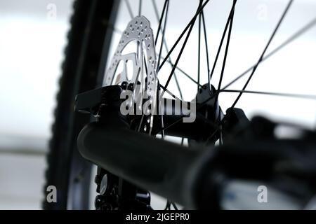 Bicycle wheel with spokes close-up. Bicycle repair. Stock Photo