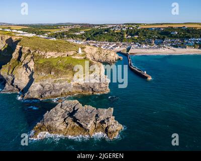 Portreath in Cornwall with Horse Rock, The Pepper Pot and Monkey Hut on the jetty. Stock Photo