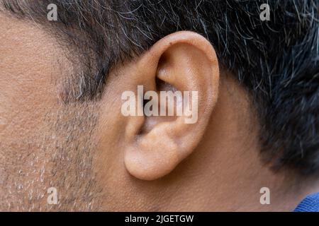 old senior man ear close-up macro shot Stock Photo