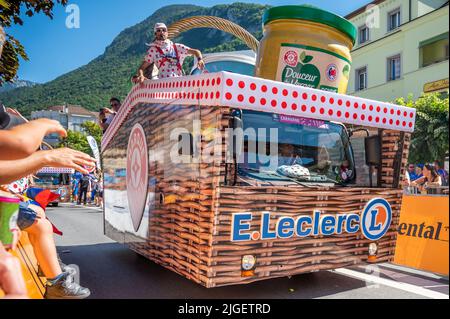 Aigle, Vaud Canton, Switzerland -10.07.2022: Passage of an advertising car of Vittel in the caravan of the Tour of France in Switzerland. Stock Photo