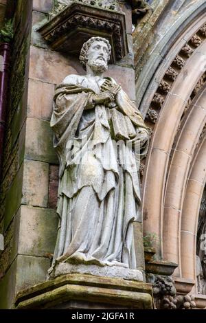 A statue on the exterior of Inverness Cathedral, or also known as St. Andrews Cathedral in the city of Inverness in Scotland, UK. Stock Photo