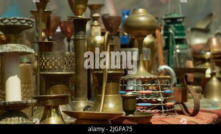 Many different size copper candlesticks Stock Photo